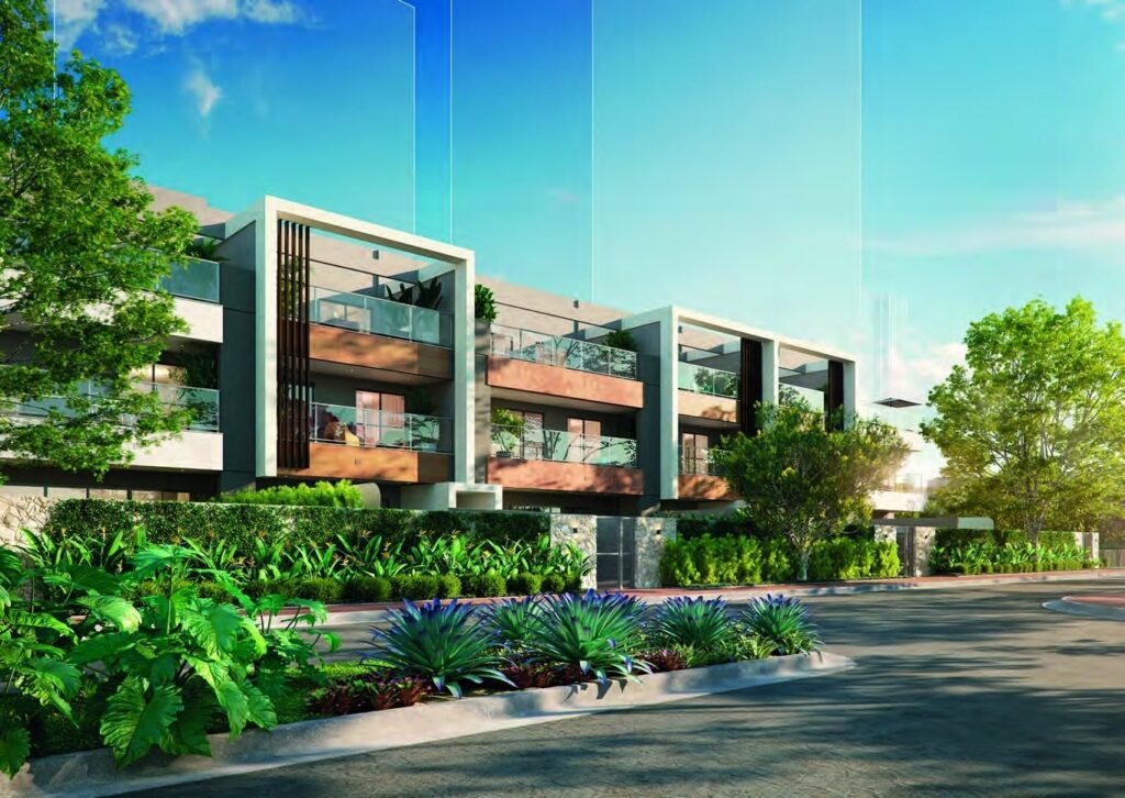 Fachada das casas do Claris Casa e Clube, com jardins no térreo