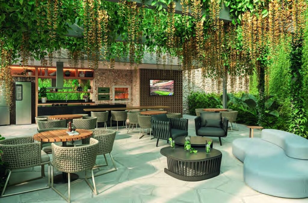 Lounge externo do Claris Clube, sob pergolado com vegetação