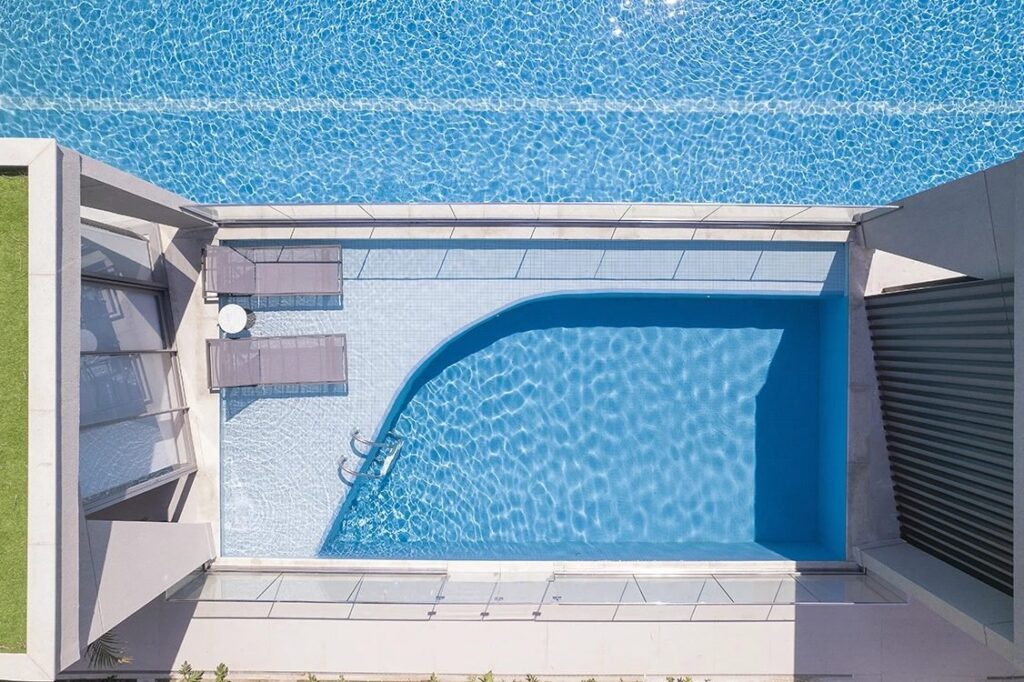 Piscina da pool house do Orygem Acqua Home