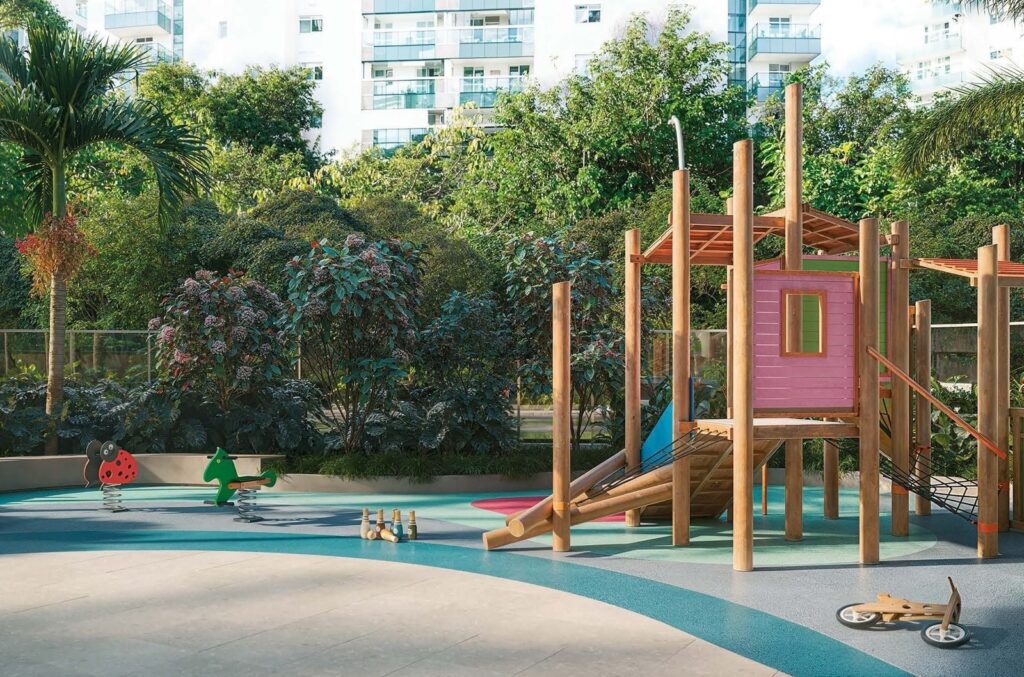Playground ao ar livre do Singular by Tegra, cercado pelo paisagismo